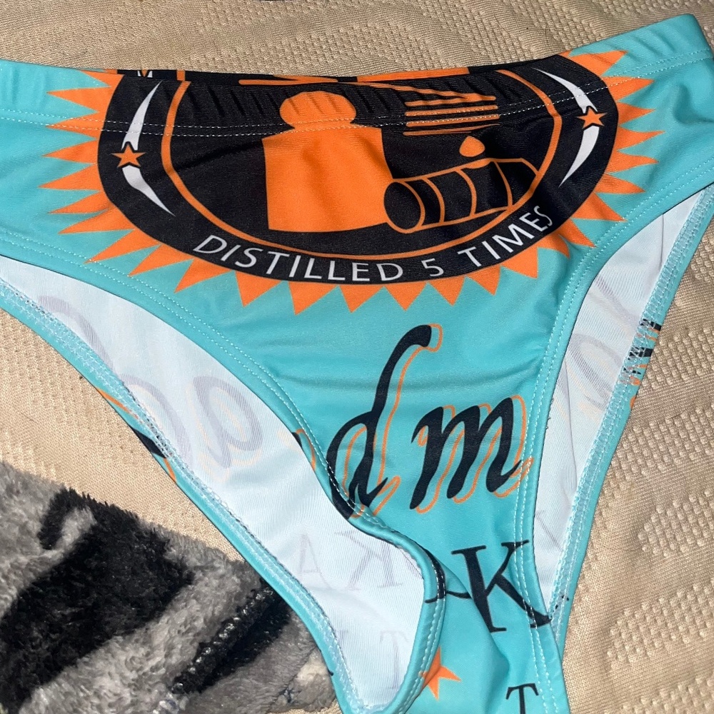 Tito’s bathing suit
